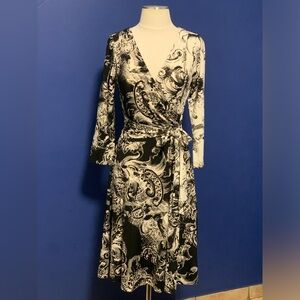 Beautifully comfortable and flattering dress. Can be dressed up or down.